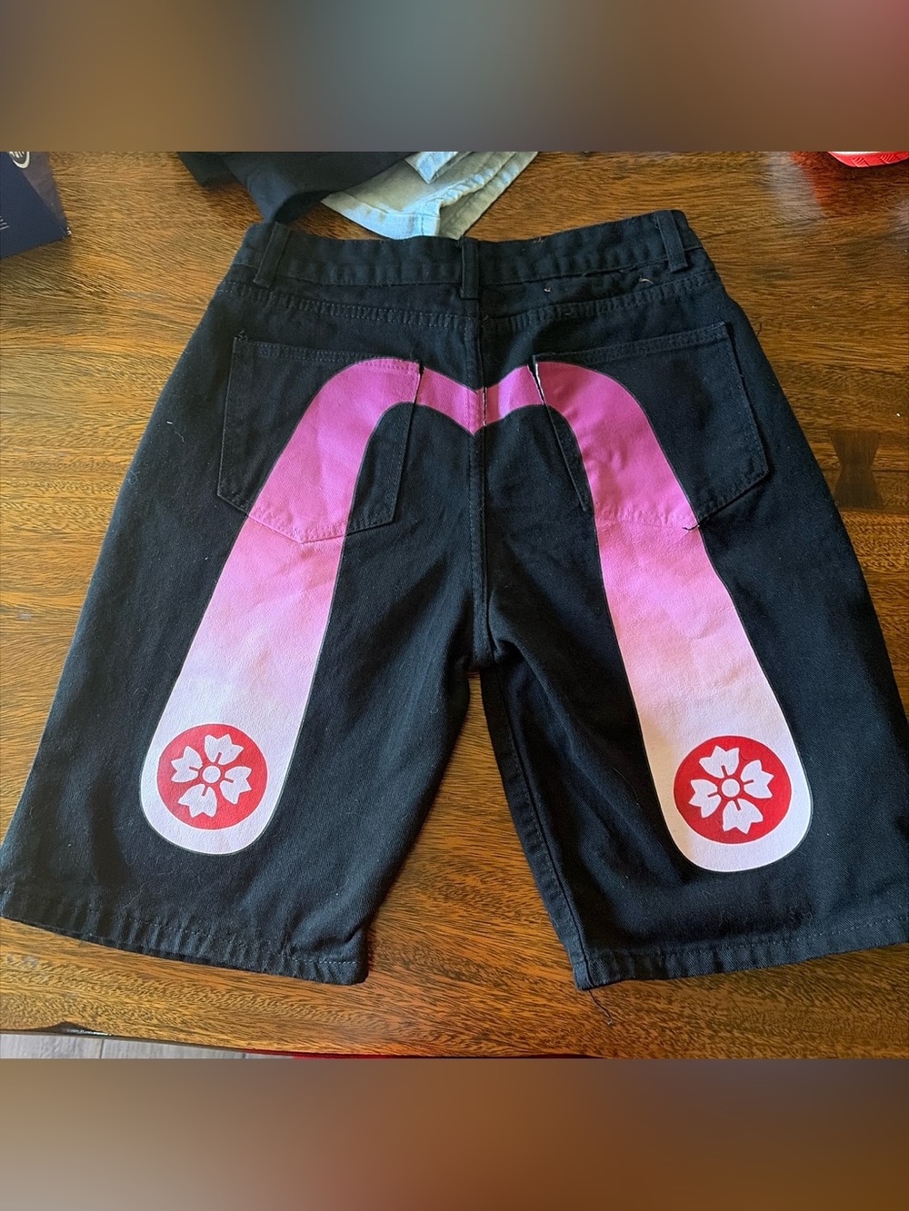 Men's Black Jean Shorts with Pink Gradient Floral Accent